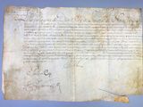 a piece of paper with writing on it sitting on top of a table