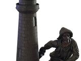 une statue représentant un homme et une horloge posée sur un socle