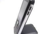 a cell phone that is sitting on top of a stand