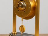 a clock that is sitting on top of a table