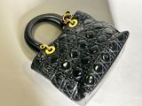 chanel black quilted leather handbag with gold hardware