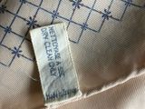 an image of a close up of a piece of clothing with a label on it