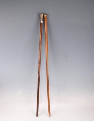 a pair of wooden chopsticks sitting on top of a table