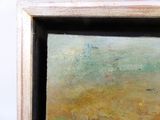 une image représentant un tableau représentant un paysage, dans un cadre en bois