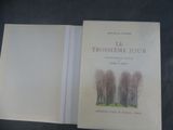 a book with a picture of trees on it