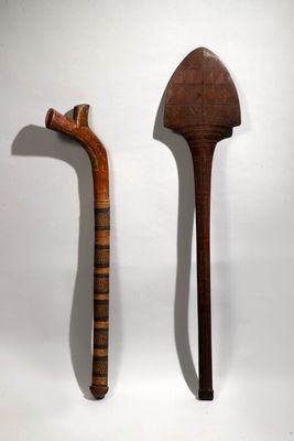 two different types of tools on display on the wall