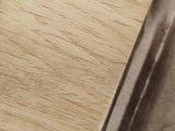 a close up of a knife on a cutting board