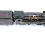 a toy train that is sitting on a white surface