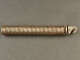 a close up of a metal spring on a table