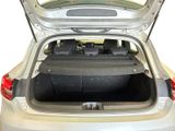the back of a car with the trunk open and the seats down