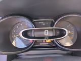 a close up of a car dashboard with various gauges