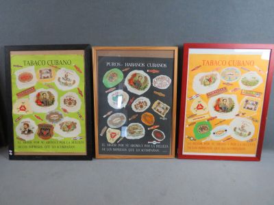 three framed menus of various types of food displayed on a table