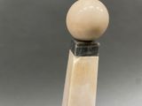 an image of a close up of a wooden stick with a ball on top