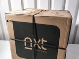 an image of a box that is wrapped up and sitting on top of a table