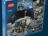 a box of legos with pictures of a space station on it