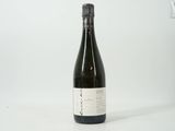 a bottle of wine that is sitting on a table