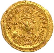une pièce d'or portant l'image d'un homme