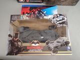 a box with a batman batmobile toy in it
