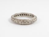 a close up of a silver ring on a white background