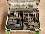 a tool box that has tools in it on the floor