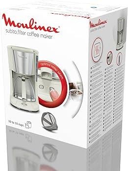 la boîte d'une cafetière est posée ouverte sur une surface blanche