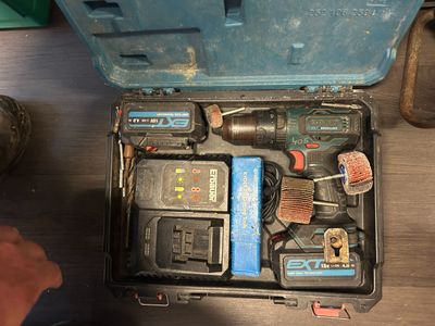 a tool box with tools in it sitting on a table