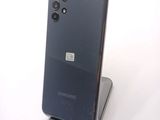 a picture of a cell phone that is on a stand