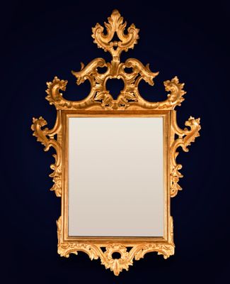 Grand miroir vénitien à cornes d'abondance en bois doré, fin…