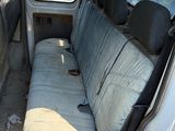 an image of a van with the seat covers down