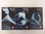 three books on a white table with a pair of handcuffs and a pair of handcuffs
