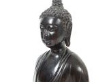 statue of a seated buddha on a white background with a white background