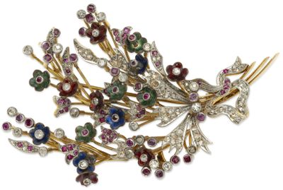an image of a close up of a brooch of flowers and leaves