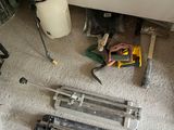 a lot of tools that are laying on the floor