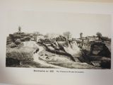 a black and white photo of a view of a town