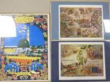 three framed pictures of islamic art hanging on a wall in a room