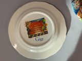a plate with a picture on it sitting on a table