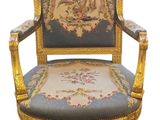 an image of a chair with a blue and gold upholstered seat