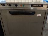 a silver dishwasher with a basket on top of it