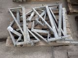 many pieces of metal sitting on top of a pallet