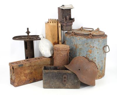 a lot of old rusty objects on a white surface