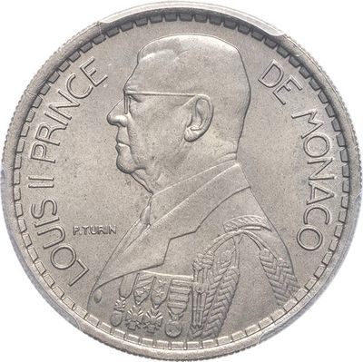 a close up of a coin with a picture of a man on it