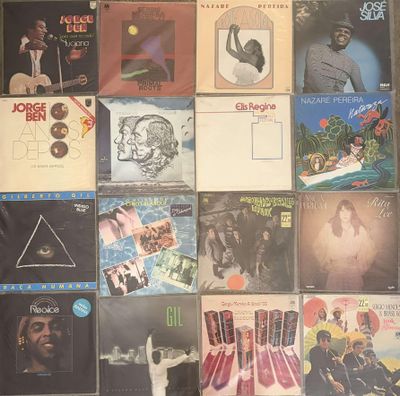 a lot of records on the wall of a room