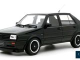 the car is black and has white rims on the tires