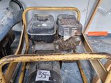 a small cart with a bunch of old gas pumps on it