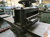 a machine that is sitting on a table in a factory