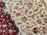 an image of a rug with a red and blue border on it