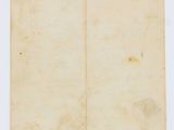 a piece of old paper with a piece of paper sticking out of it
