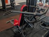 a gym with a lot of equipment in the room