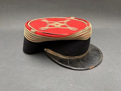 a red hat with a skull and crossbone on it