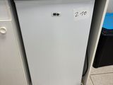a small white dishwasher sitting in the corner of a kitchen